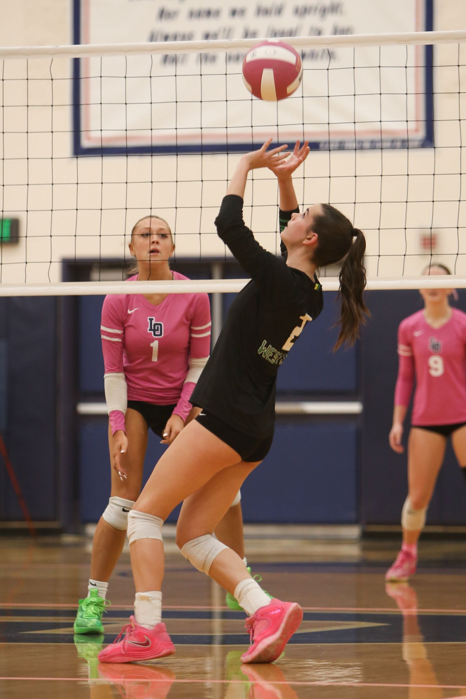 West Linn Lions Varsity Volleyball game photographed by Miles Butler Photography