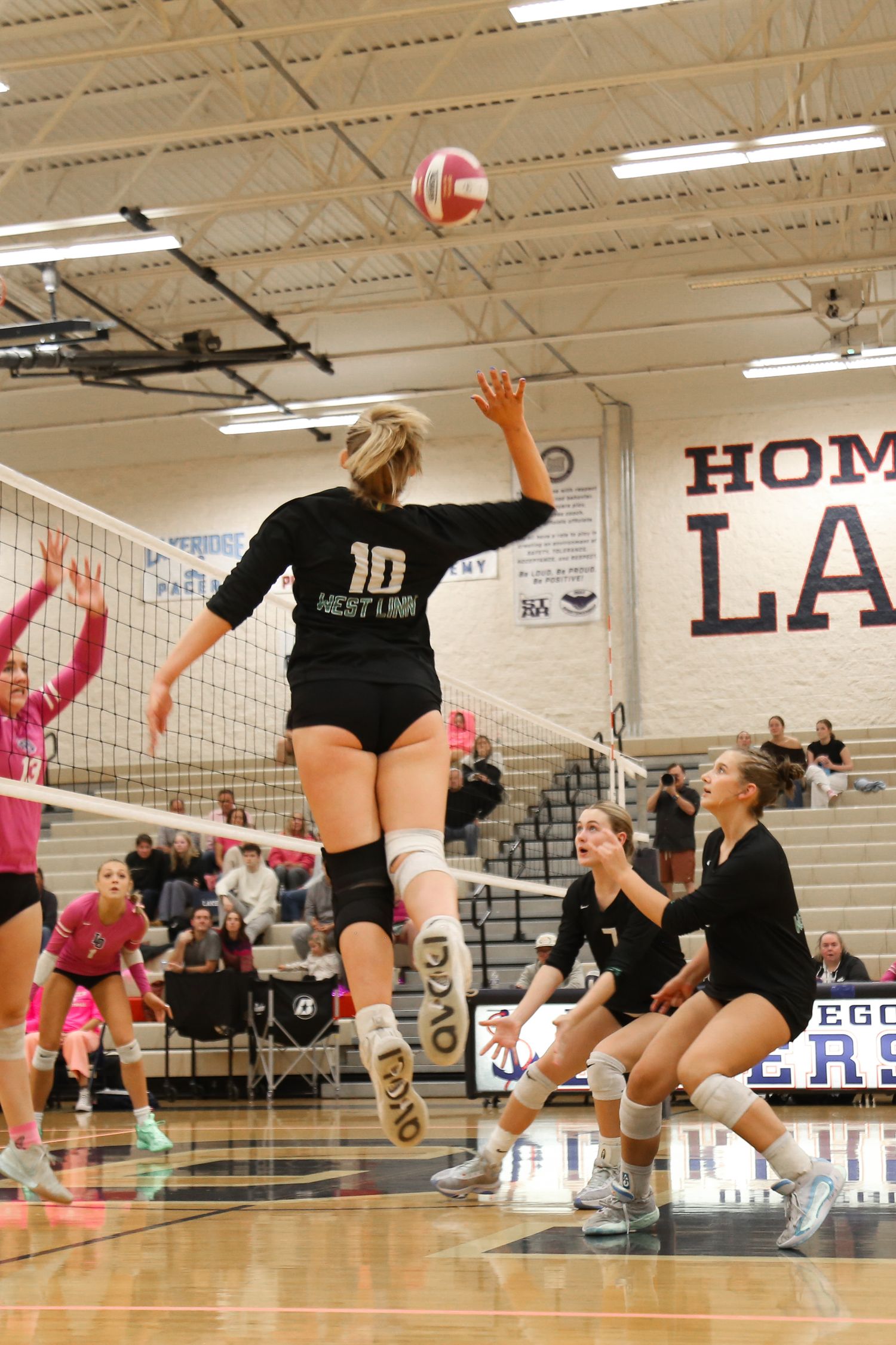 West Linn Lions Varsity Volleyball game photographed by Miles Butler Photography