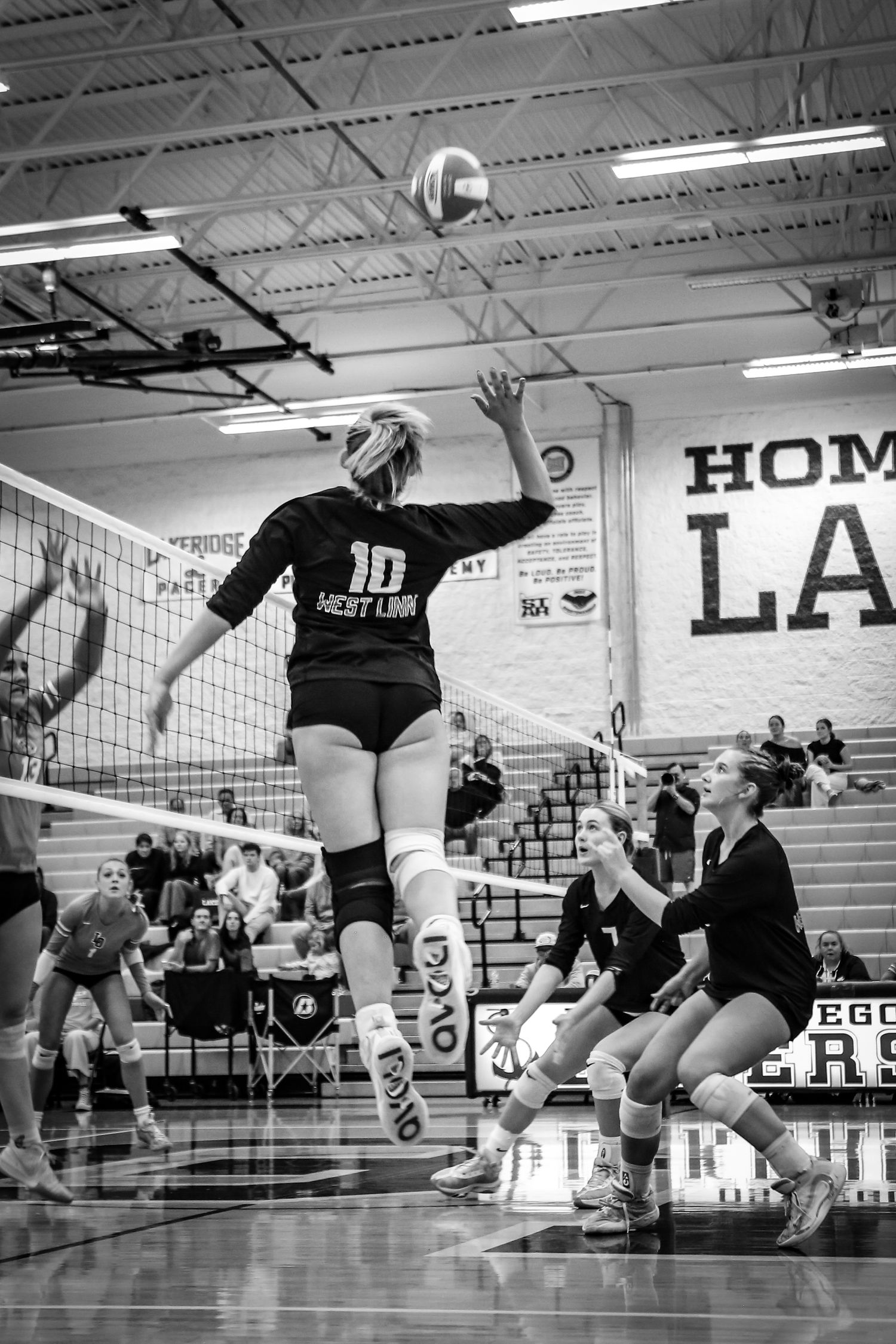 West Linn Lions Varsity Volleyball game photographed by Miles Butler Photography