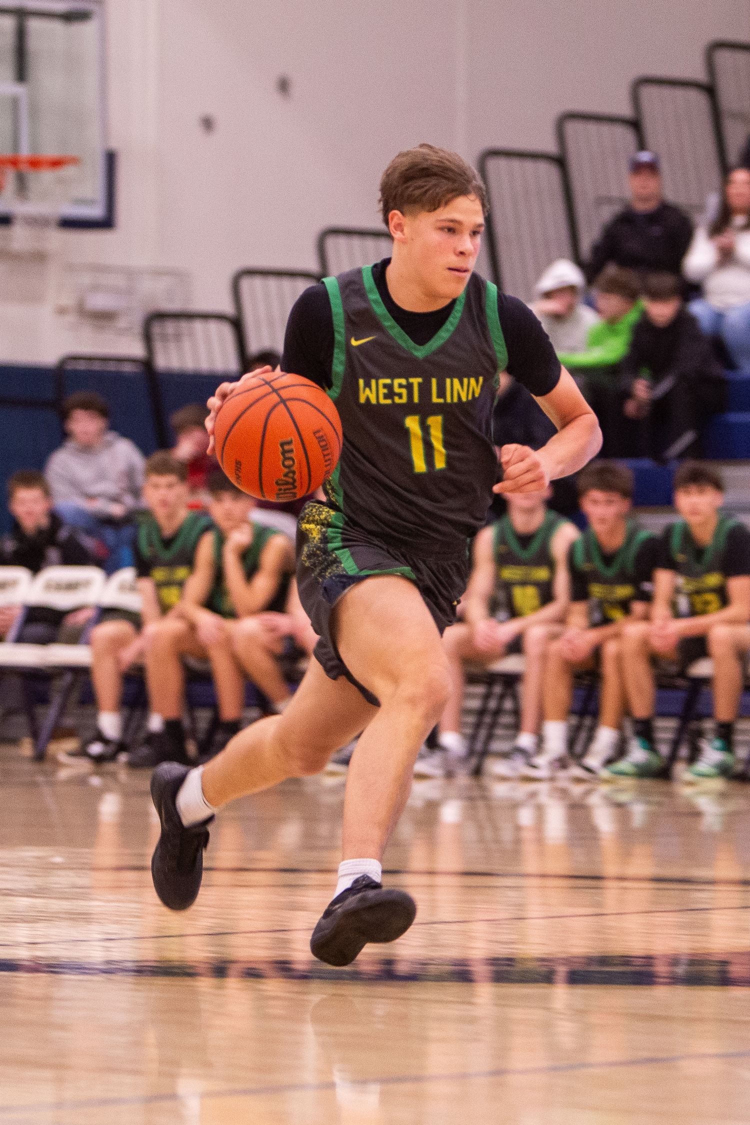West Linn Lions Varsity Boys Basketball game photographed by Miles Butler Photography