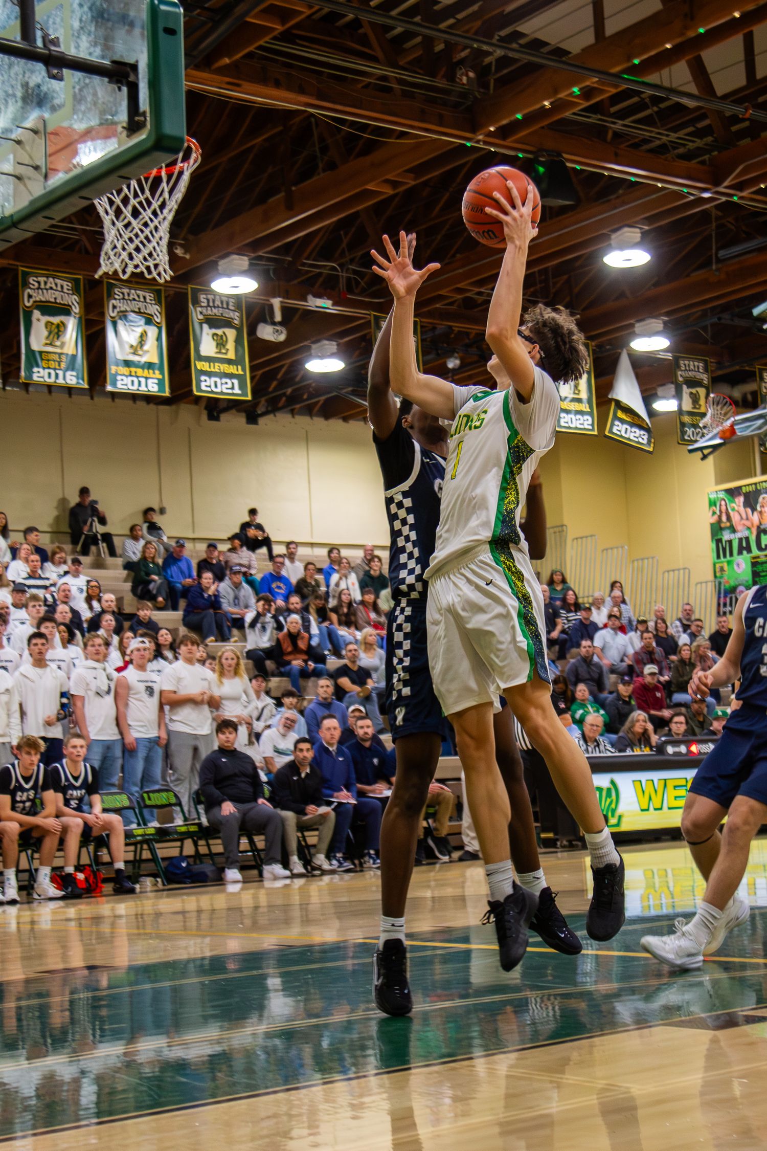 West Linn Lions Varsity Boys Basketball game photographed by Miles Butler Photography