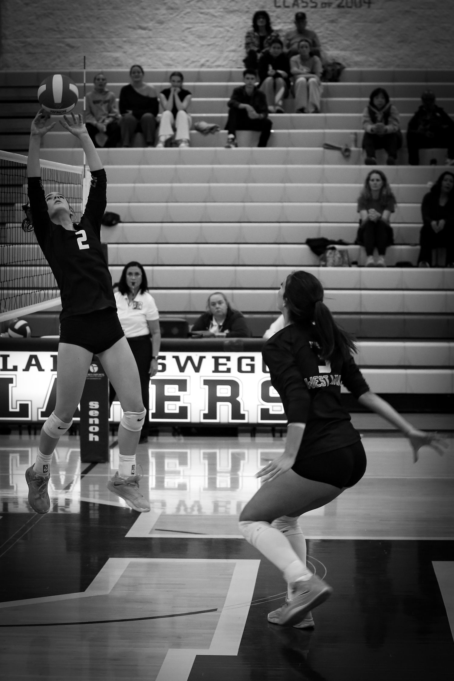 West Linn Lions Varsity Volleyball game photographed by Miles Butler Photography