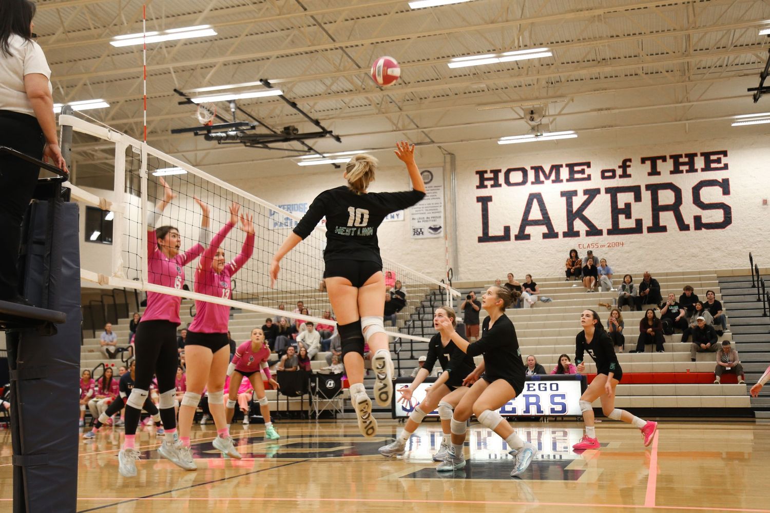 West Linn Lions Varsity Volleyball game photographed by Miles Butler Photography