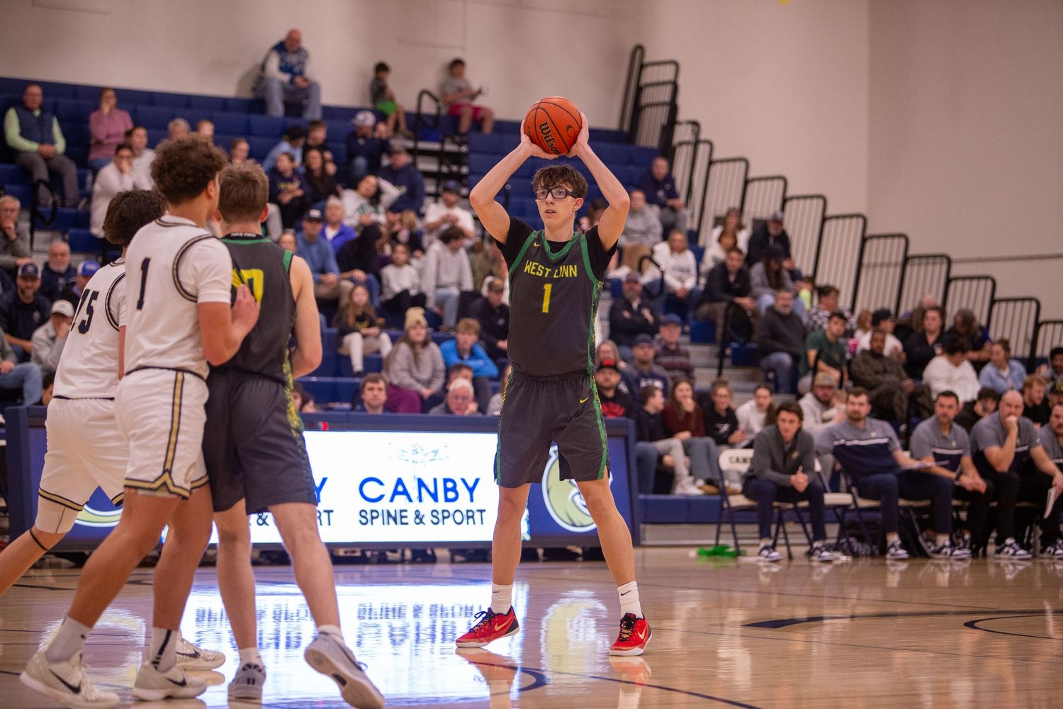 West Linn Lions Varsity Boys Basketball game photographed by Miles Butler Photography