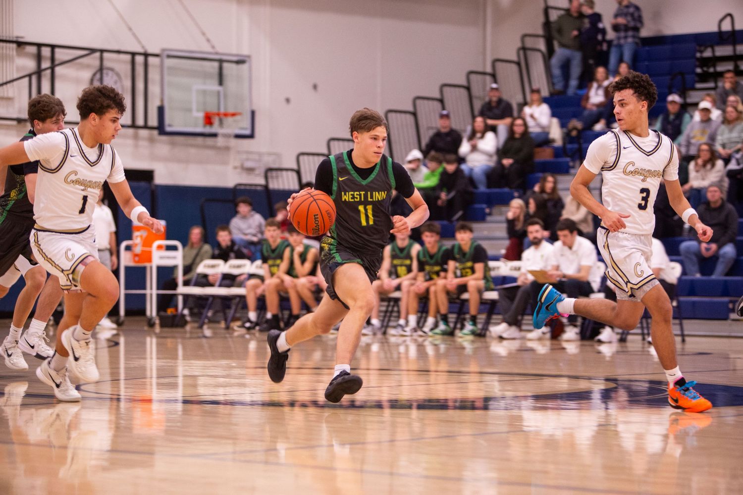 West Linn Lions Varsity Boys Basketball game photographed by Miles Butler Photography