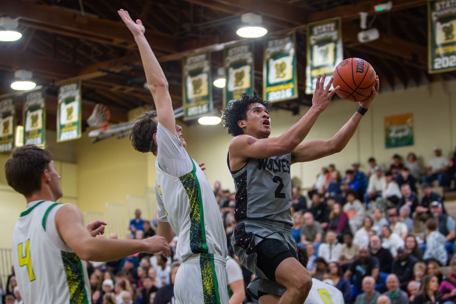 West Linn Lions Varsity Boys Basketball game photographed by Miles Butler Photography