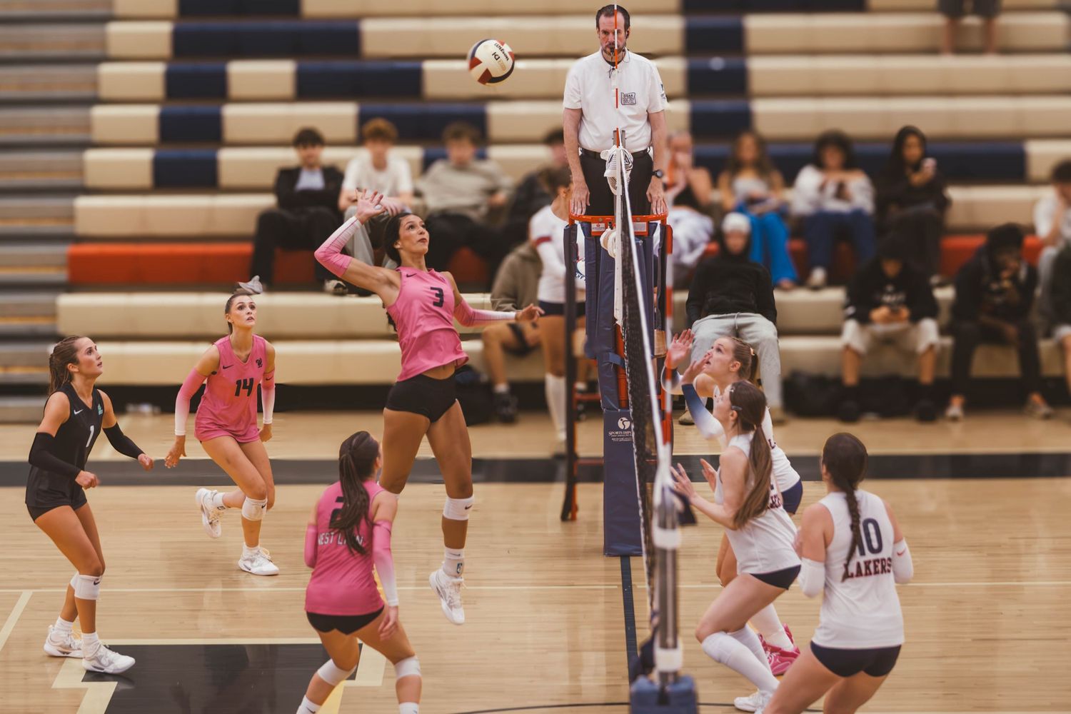 West Linn girls varsity volleyball vs. Lake Oswego, photographed by Miles Butler Photography in Oregon.