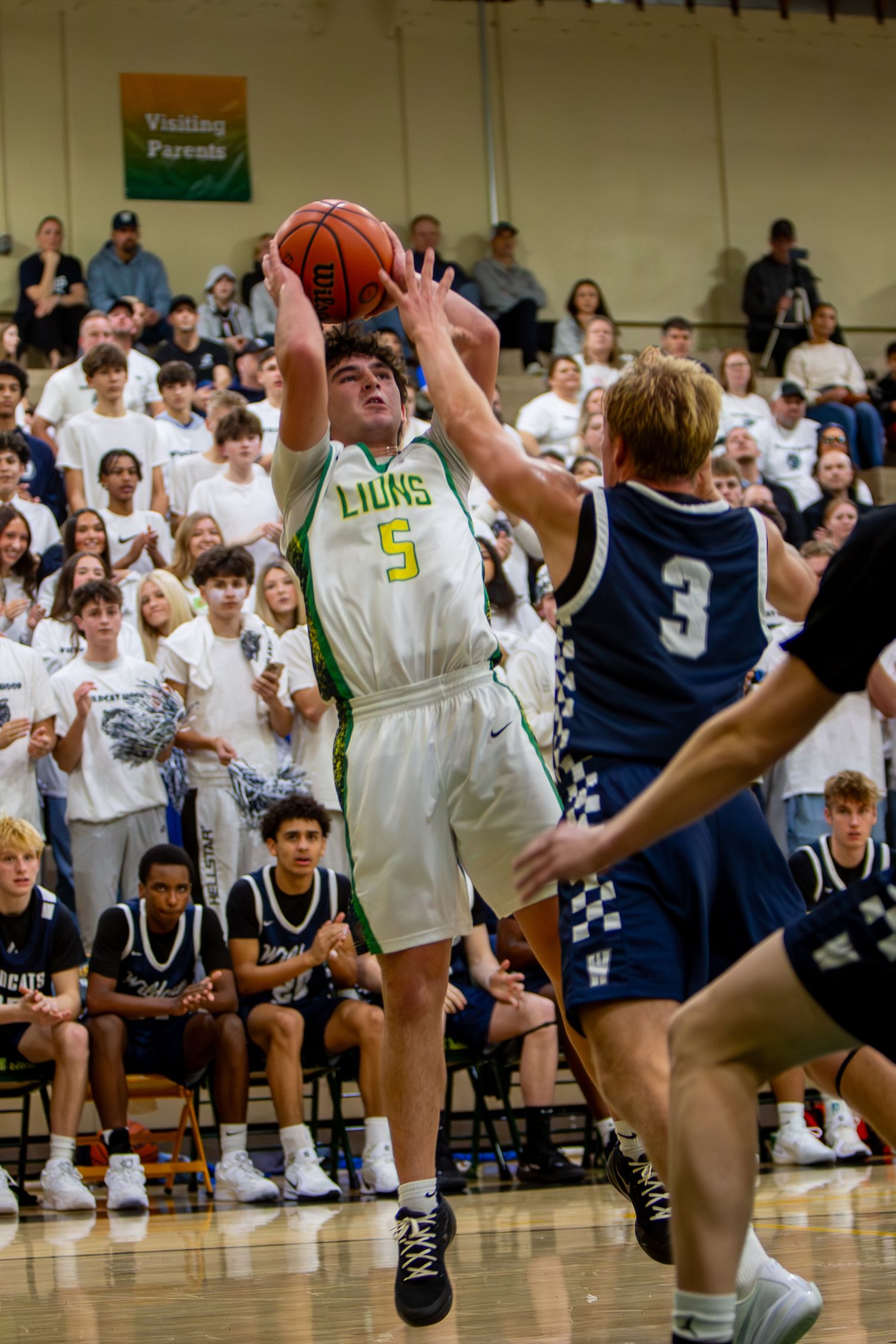 West Linn Lions Varsity Boys Basketball game photographed by Miles Butler Photography