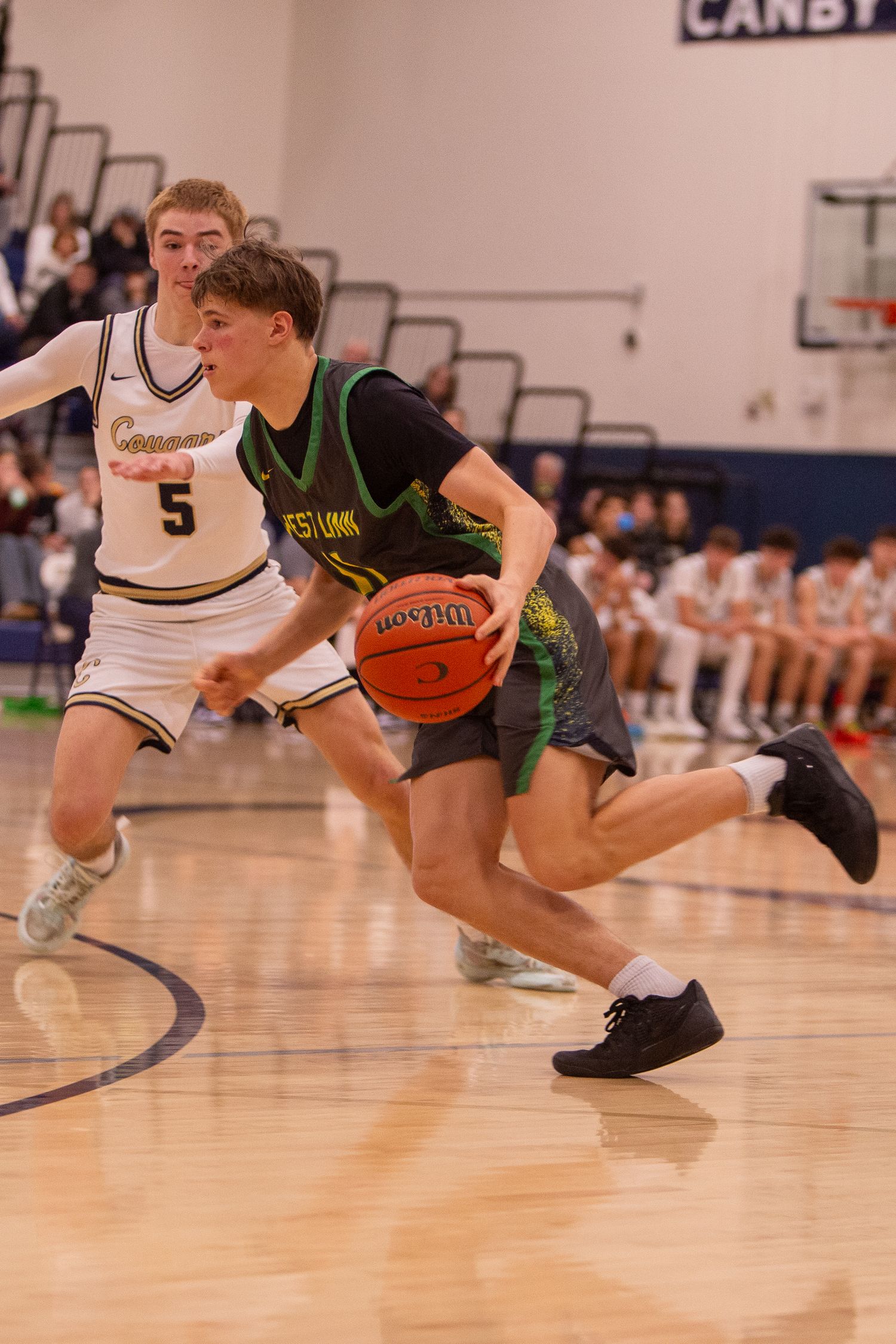 West Linn Lions Varsity Boys Basketball game photographed by Miles Butler Photography