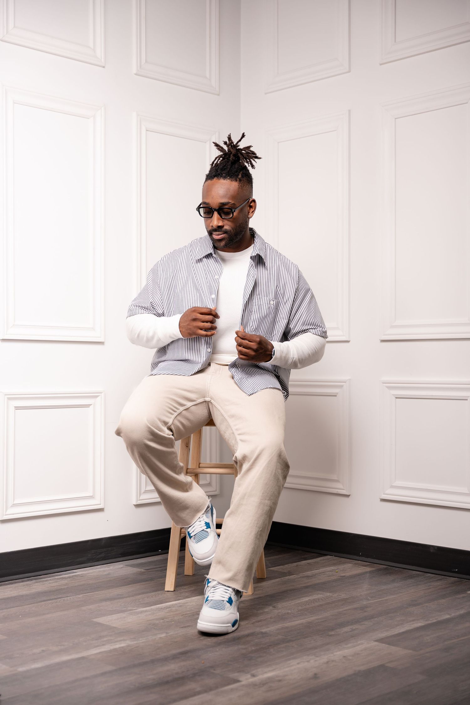Casual lifestyle photos in white room with wooden floors and modern furniture.