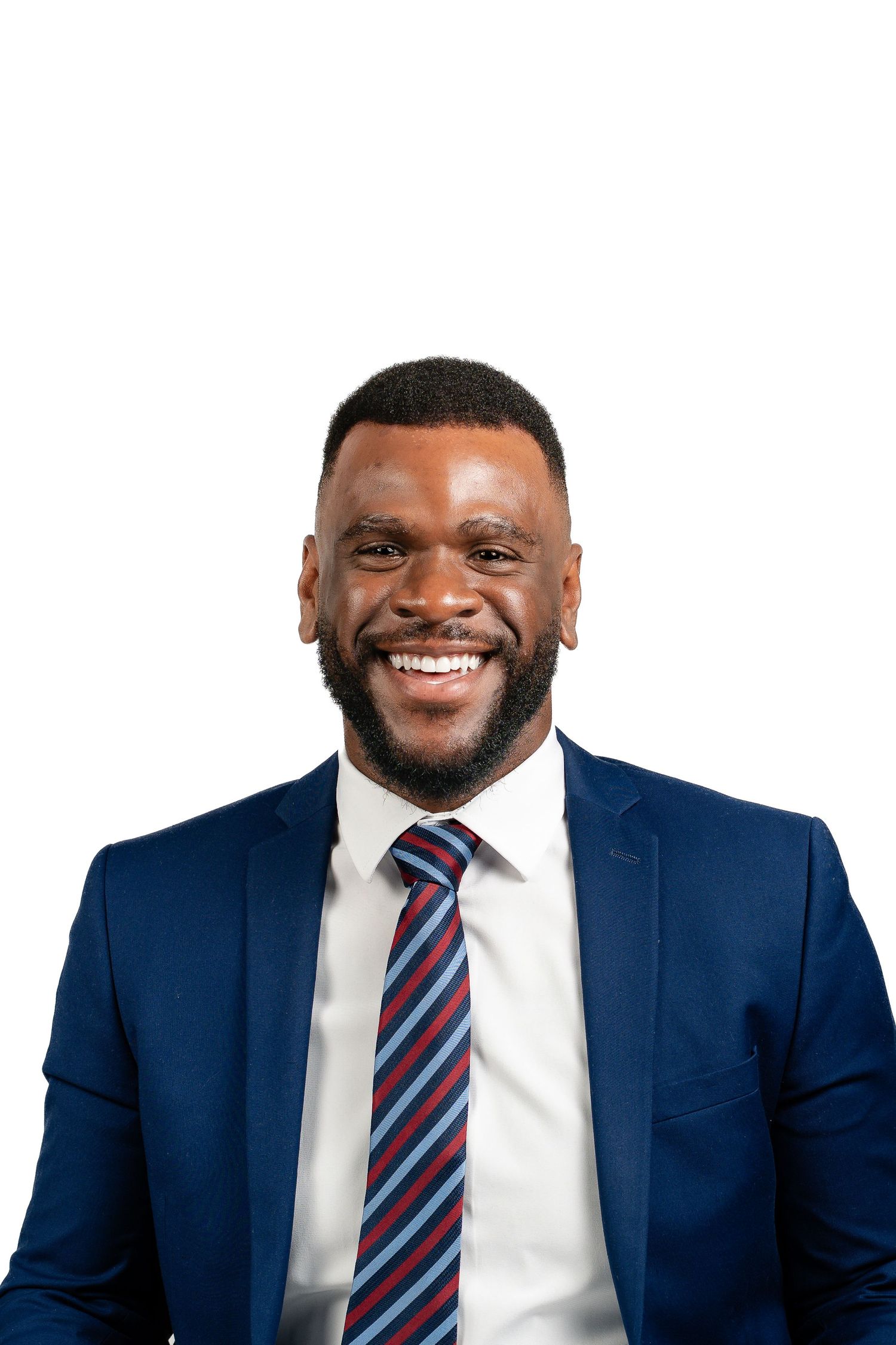 Professional wearing navy suit with striped tie shown in multiple expressions against white backdrop.