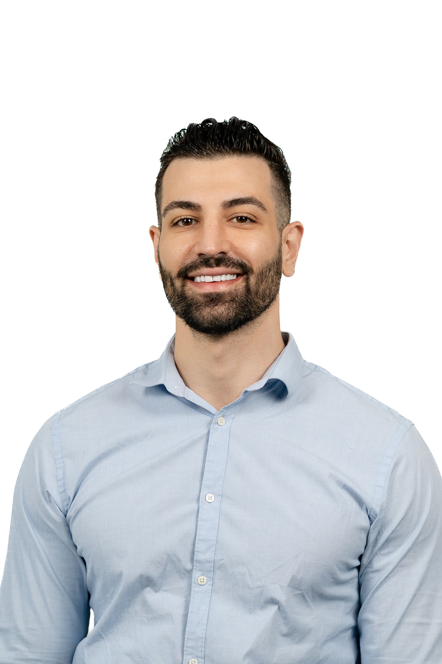 Professional headshots of a person in a light blue dress shirt smiling against white background.