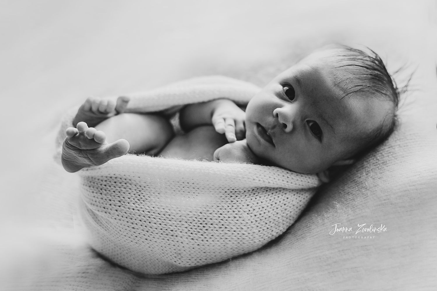 newborn-baby-wrapped-studio