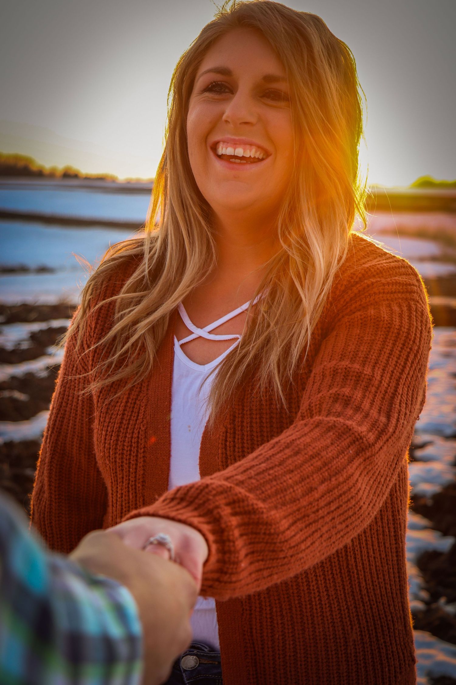 Engaged women at sunset