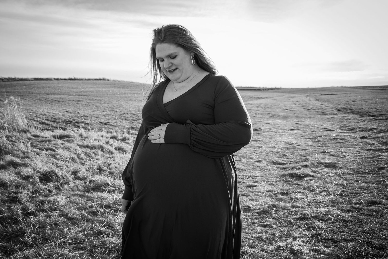 Expectant mom in Iowa field