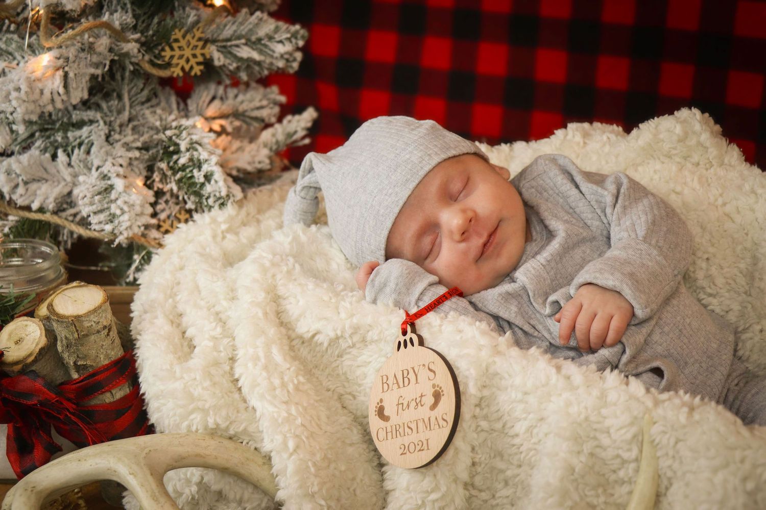 Newborn baby boy first Christmas