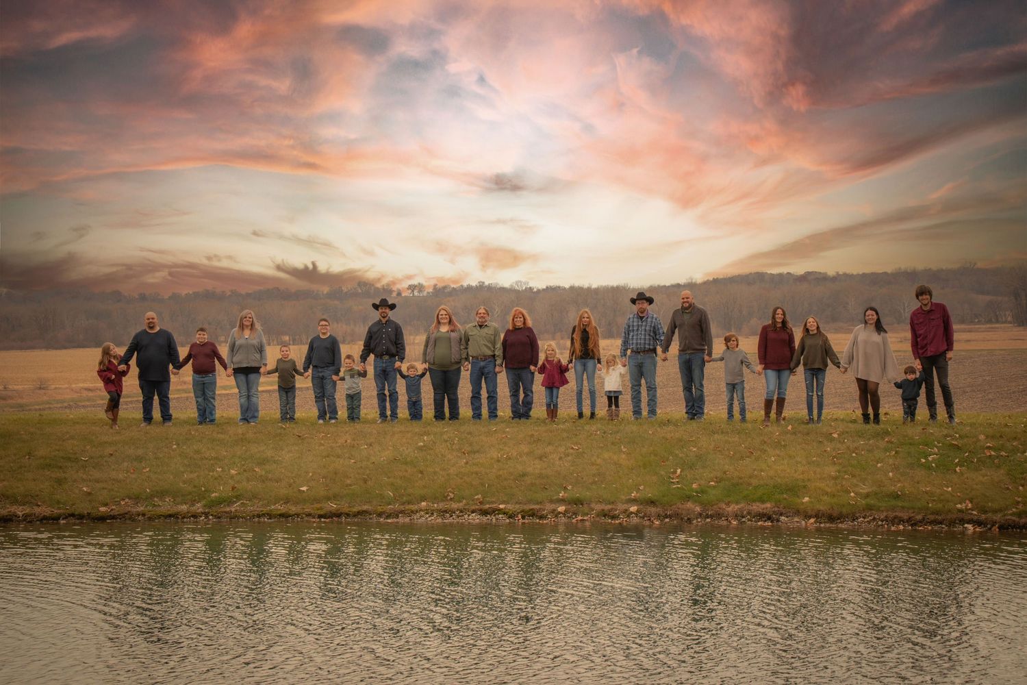 Extended family by a pond