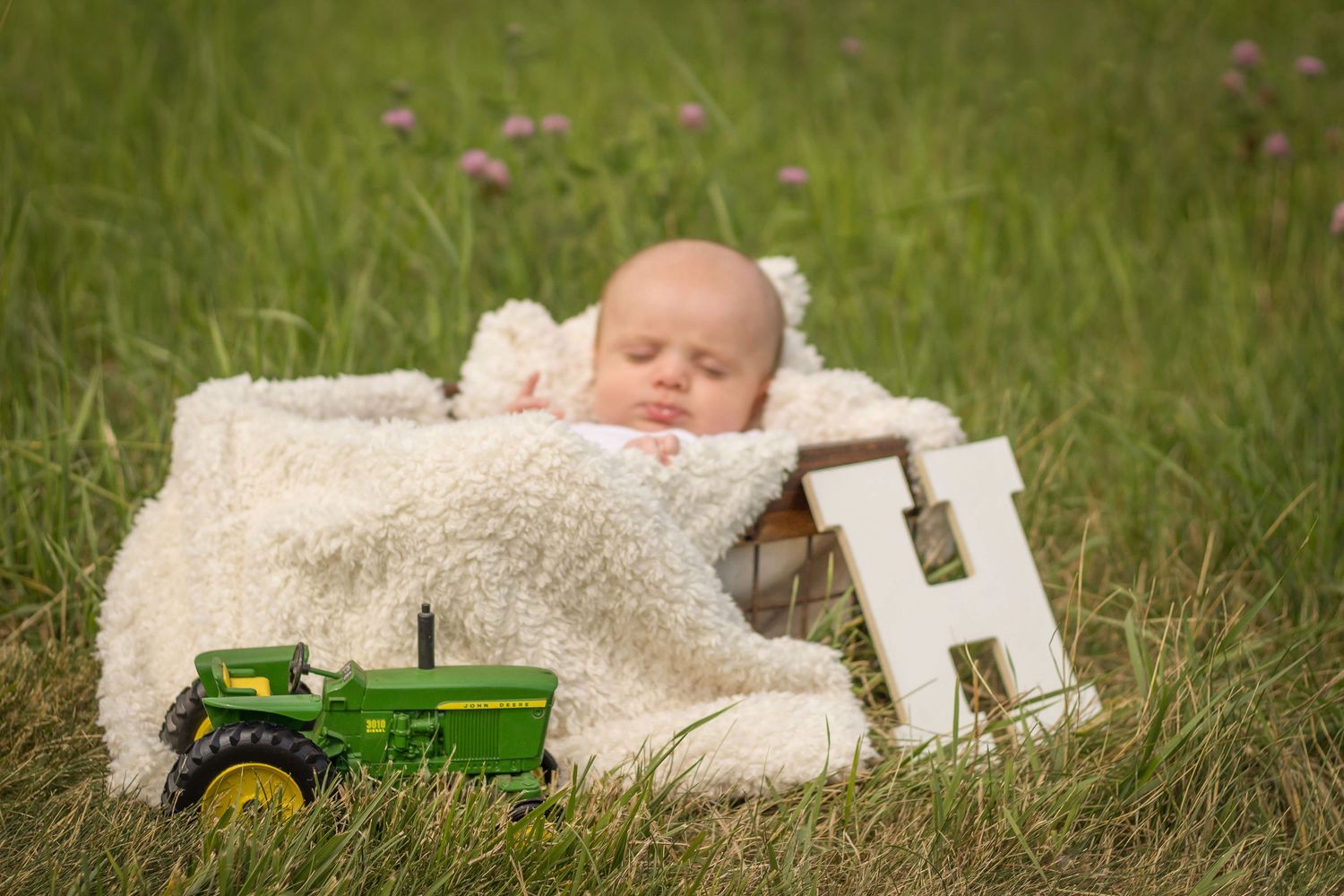 Newborn with a tractor