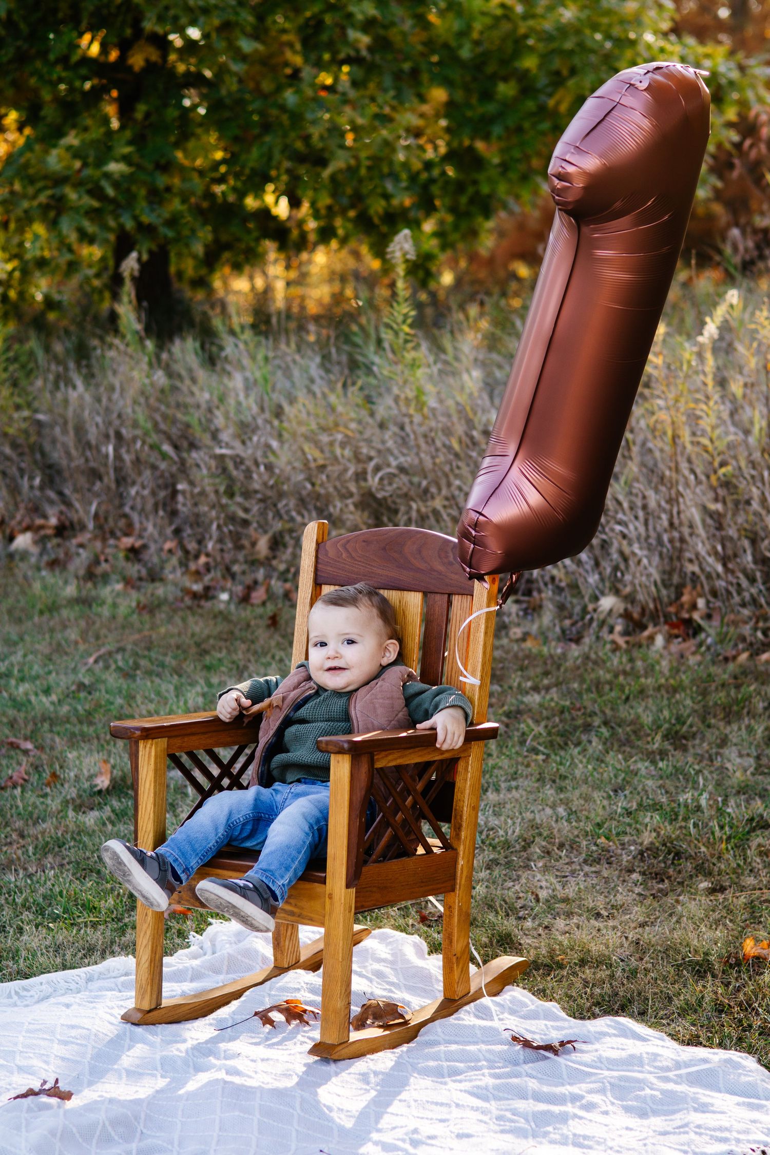 A sequence of photos showing a child's first birthday milestone session.