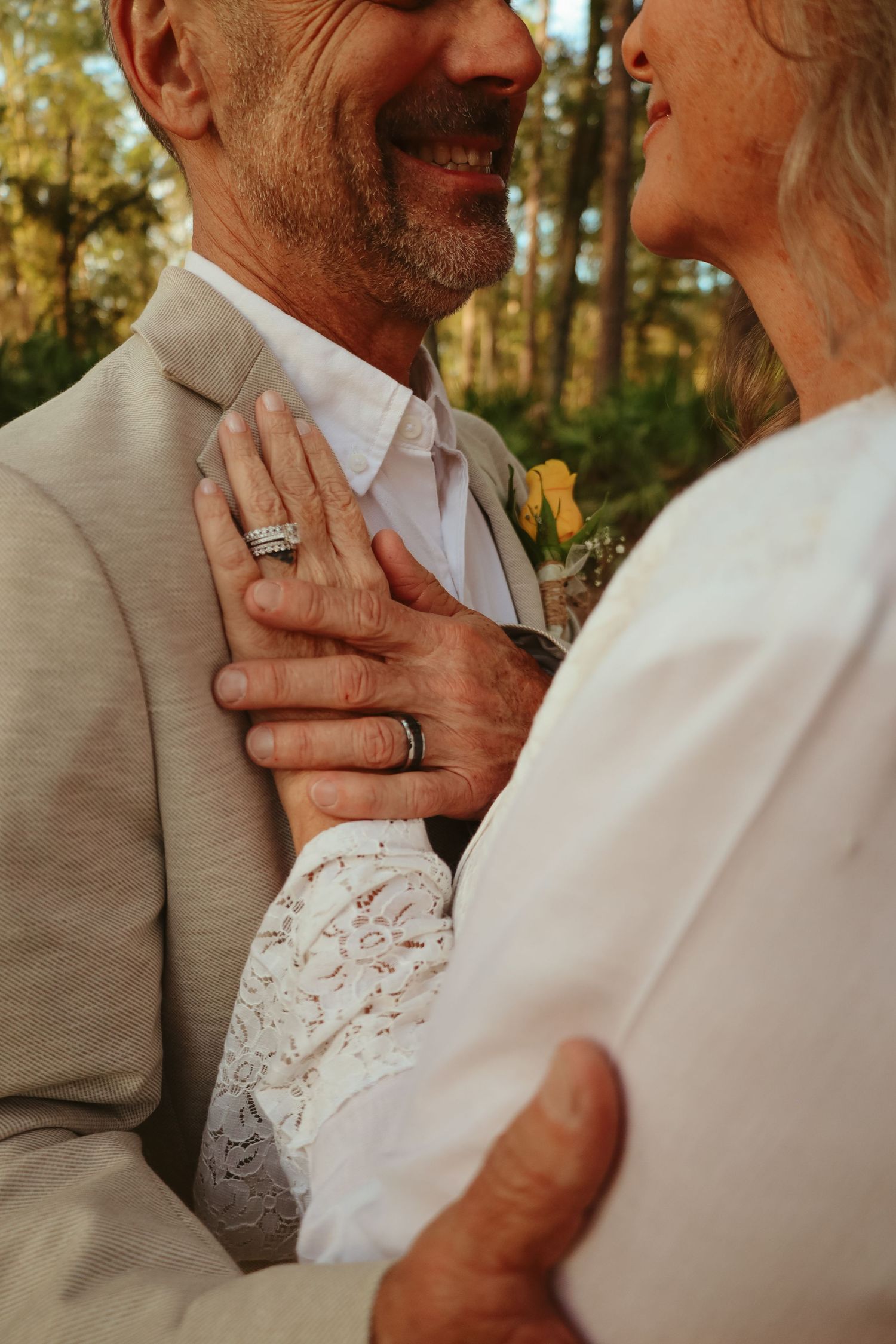 A romantic series of close-up shots showing tender moments between a couple in formal attire during golden hour.