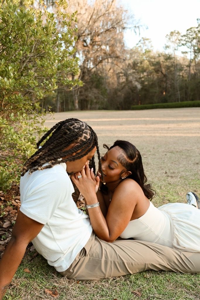 A sequence of artistic outdoor photos showing a person lying on grass in white clothing.