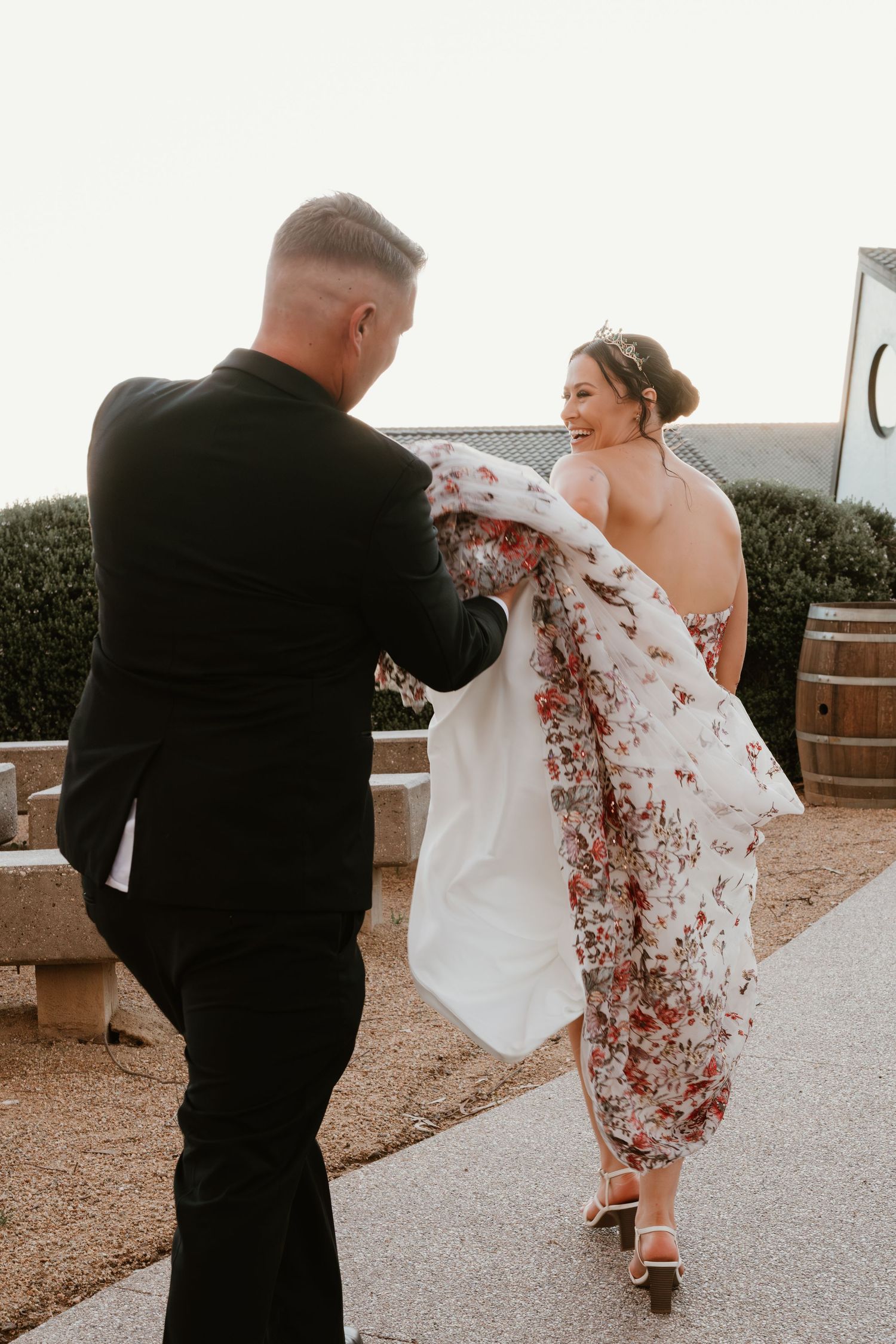 A playful dancing moment captured between newlyweds on their wedding day.