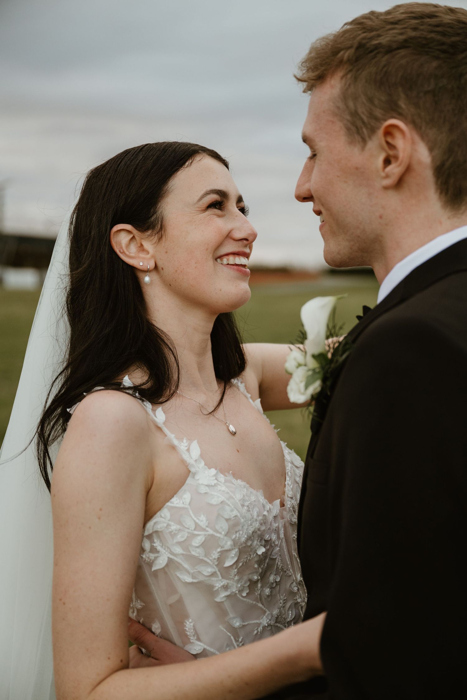 Series of tender candid moments between bride and groom showing natural reactions and emotions.