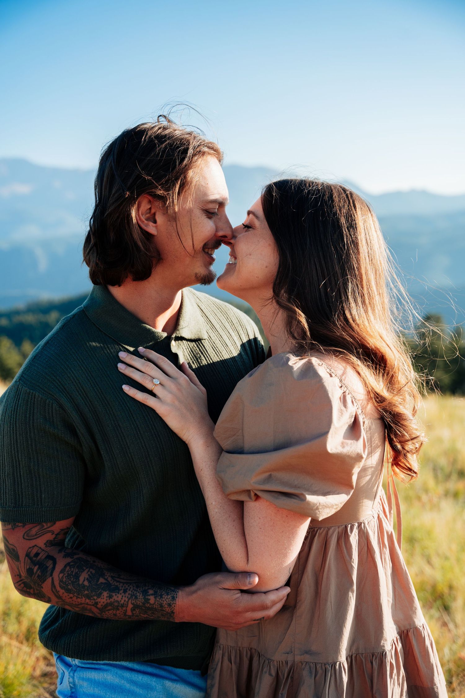 Couple laughing and kissing