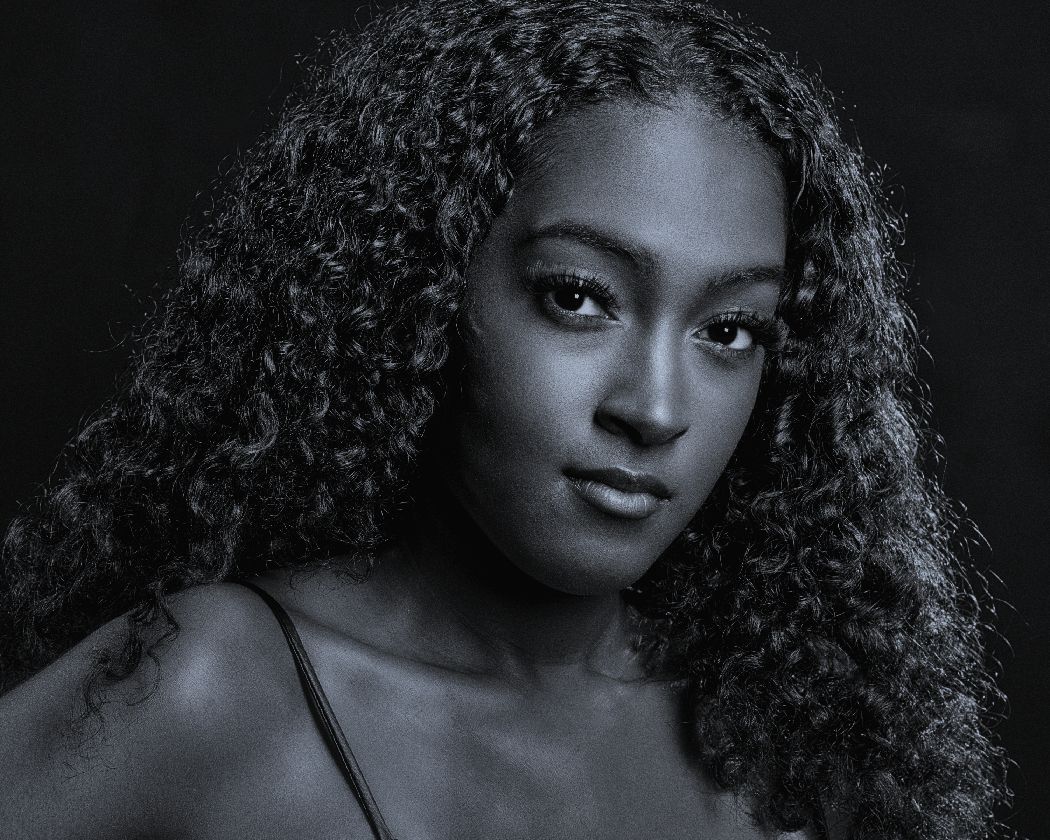 A series of black and white portraits showing curly hair and dramatic lighting against a dark background.
