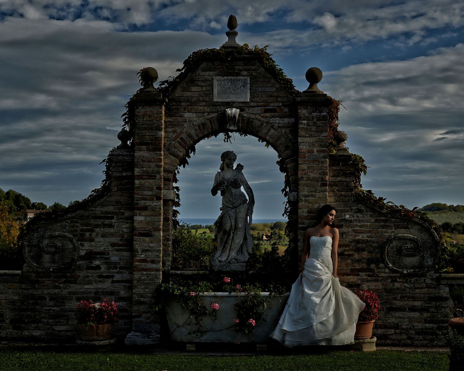 A dramatic wedding photo series showing silhouettes against stone ruins and moody cloudy skies.
Horvath-Photography-Sam-Sciarrino