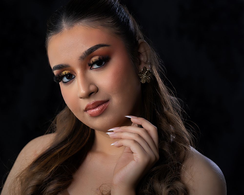 A series of glamour portraits against a dark background showing dramatic lighting and elegant poses.