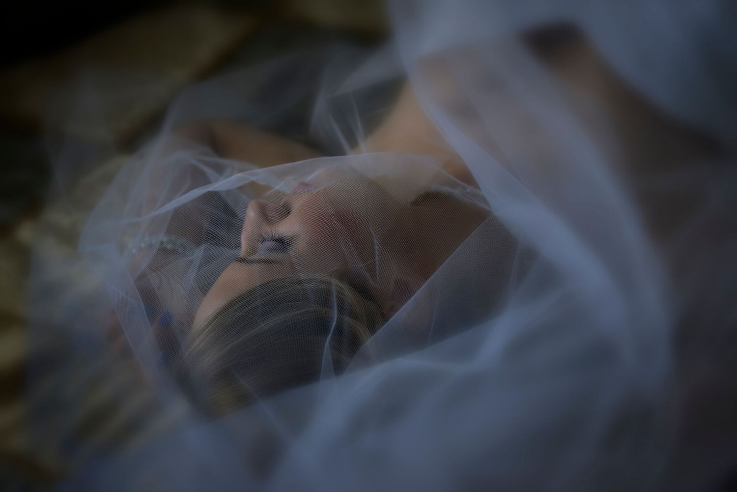 A close-up view of burning incense sticks creating swirling smoke patterns against a dark background.
Horvath-Photography-Sam-Sciarrino