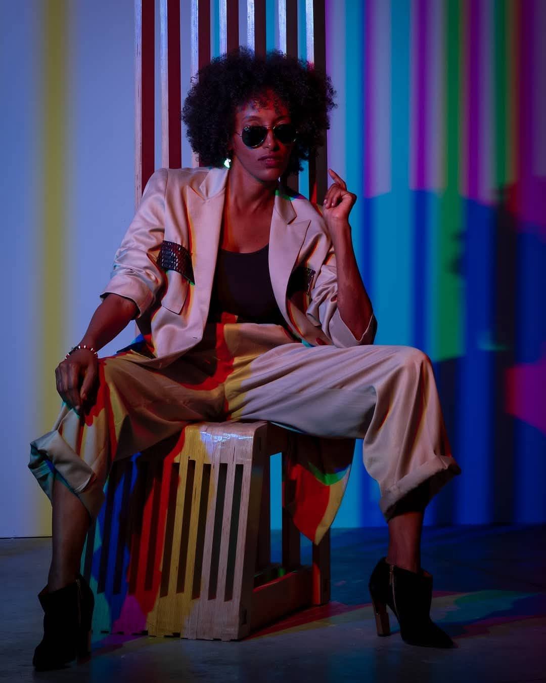 Creative portrait of female model in bold fashion styling in Dubai with colorful set by Atlanta editorial photographer APQ Creative.