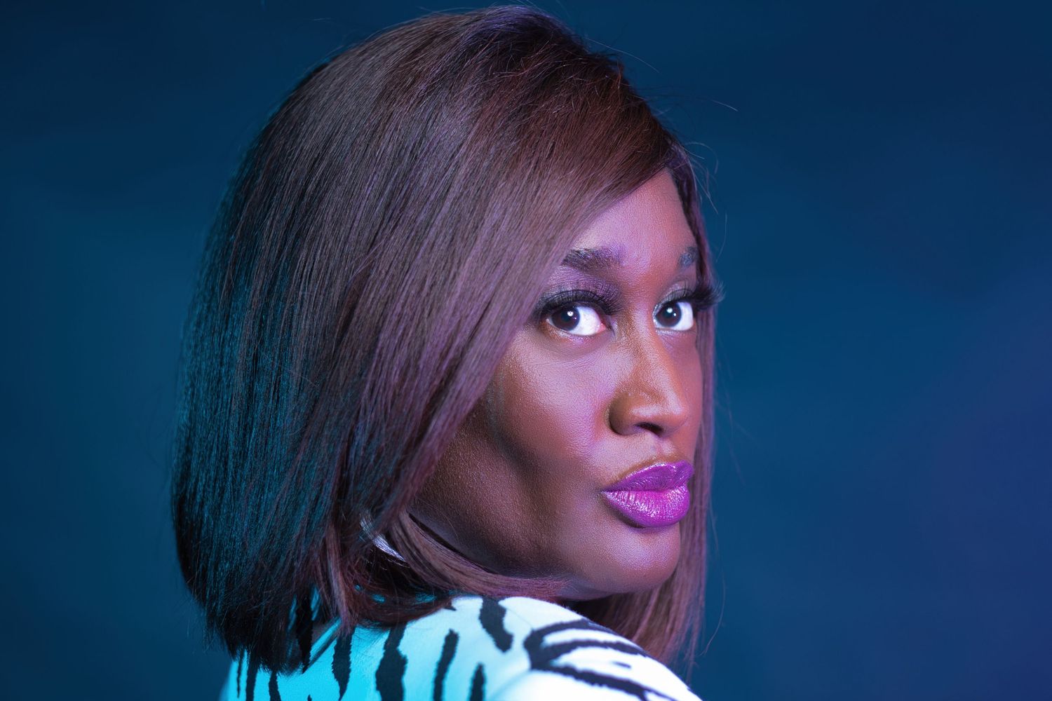 Editorial fashion portrait of Black woman in bold styling by creative portrait photographer in Atlanta, APQ Creative.