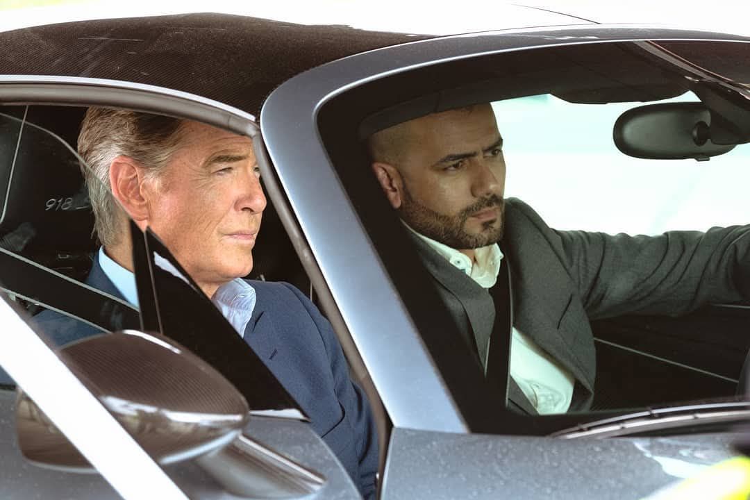 Editorial celebrity portrait of two men in luxury car by Atlanta brand photographer APQ Creative.