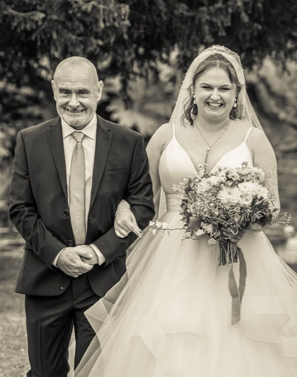 A series of five black and white wedding photos showing joyful moments between a bride and her escort outdoors.