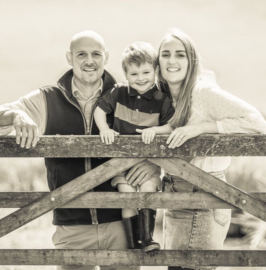 A sepia-toned collage of family photos arranged horizontally showing outdoor moments together on wooden structures.