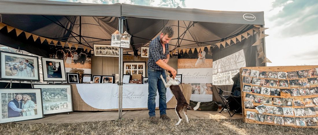 A rustic barn wedding venue decorated with string lights and vintage decor creates a cozy romantic atmosphere.