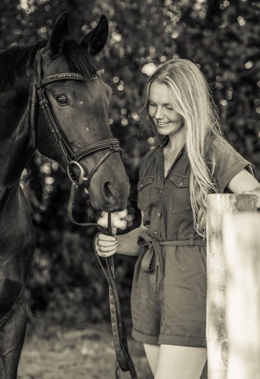 A series of black and white photos showing tender moments between a horse and rider in an outdoor setting.