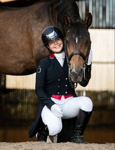 A series of connected photos showing tender moments between a person and a dark brown horse in a stable setting.