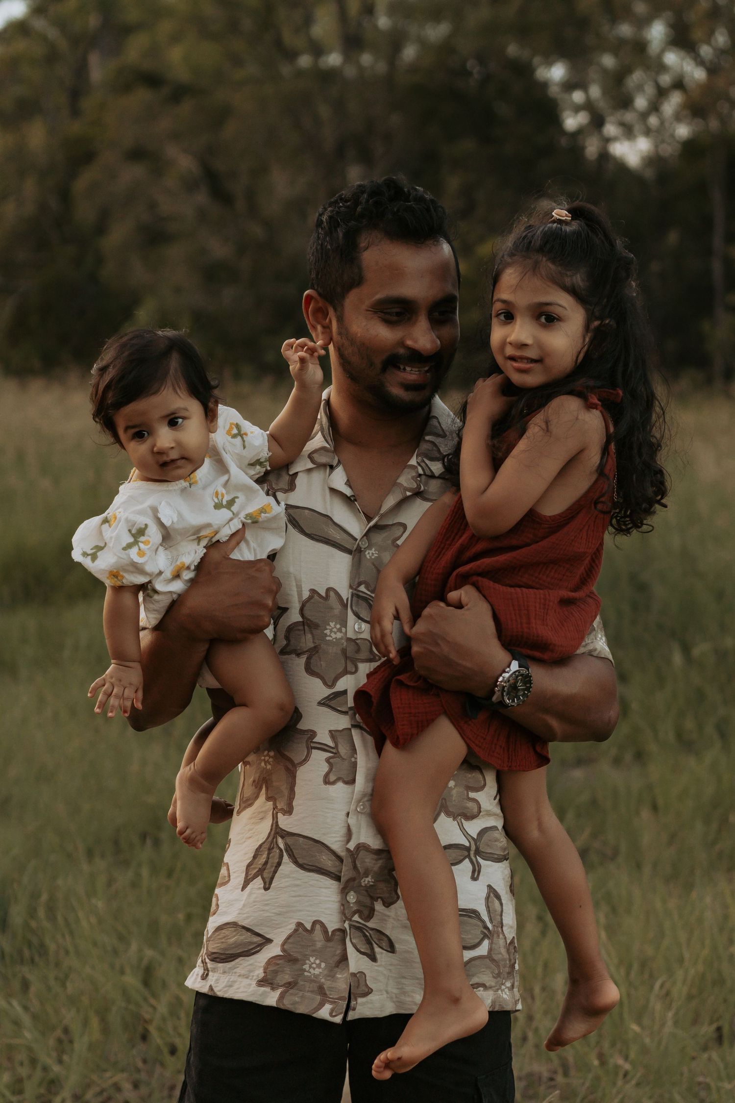 A father with his 2 girls, forever his little girls in a family photography shoot