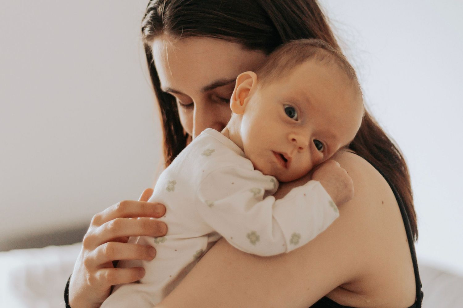 Tiny fingers, sleepy cuddles, and the beginning of a lifetime of memories. Fraser Coast Photographer
