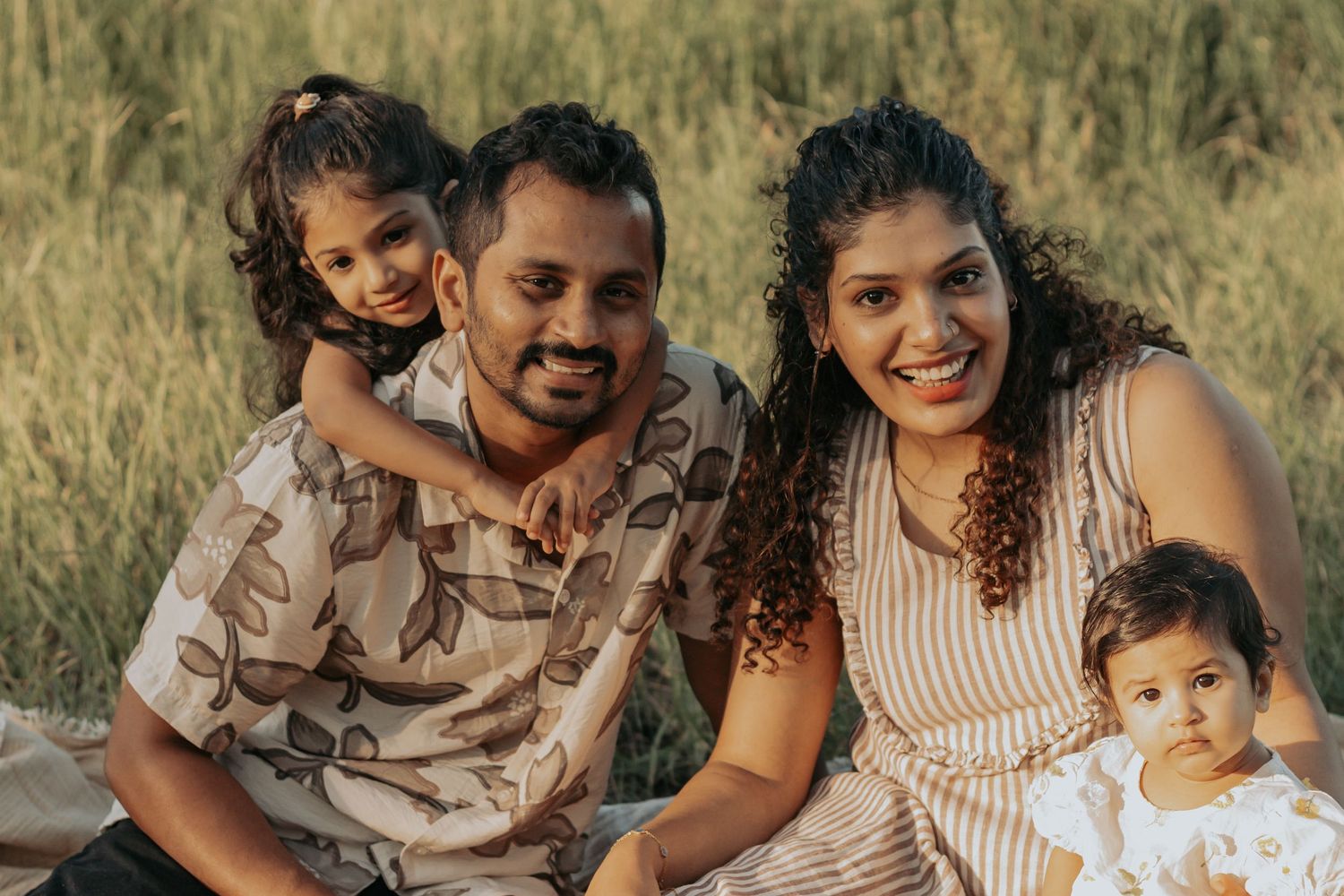 This beautiful family, enjoying the sun and first time photographs in Hervey Bay
