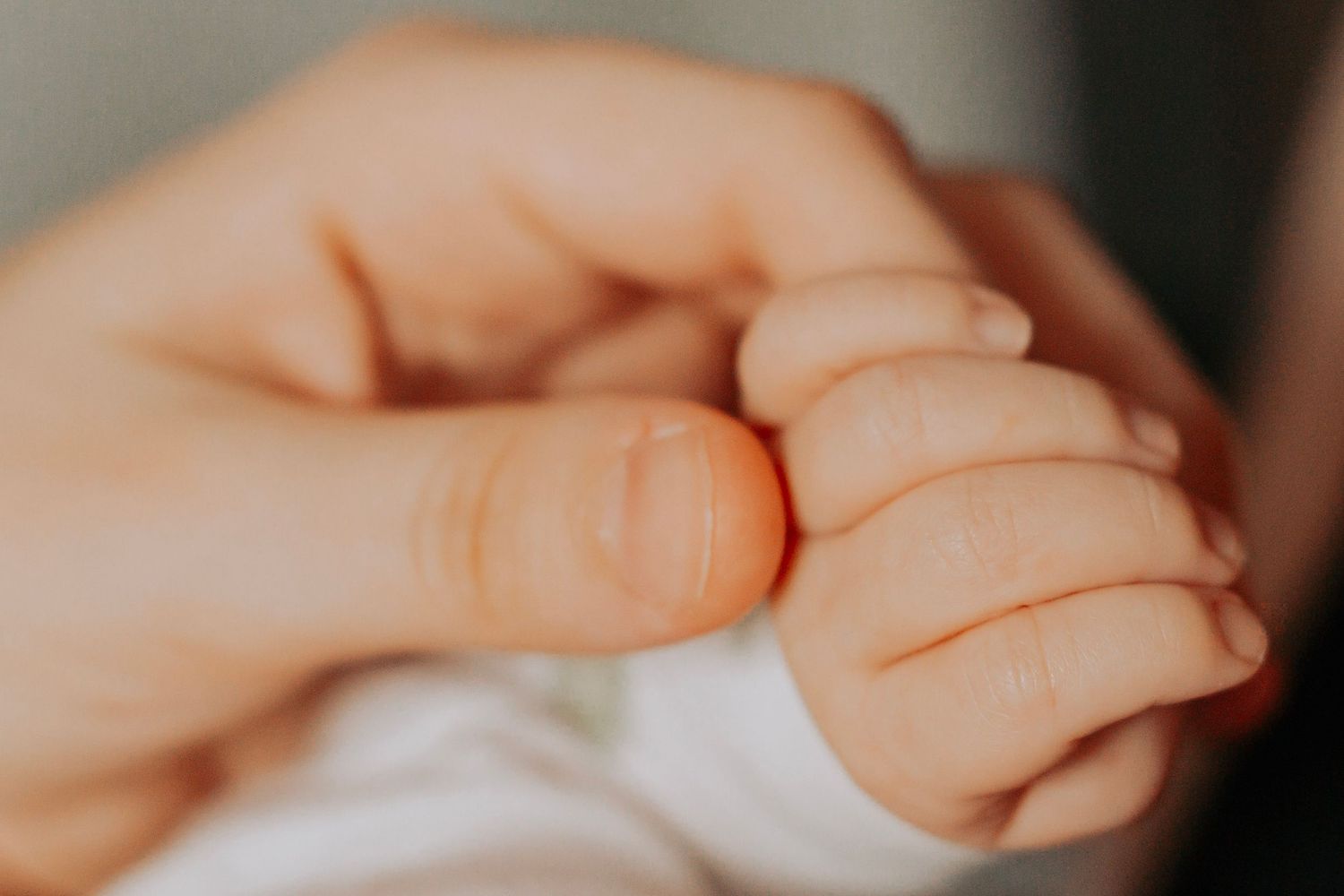 Tiny fingers, sleepy cuddles, and the beginning of a lifetime of memories. Natural Family Photography