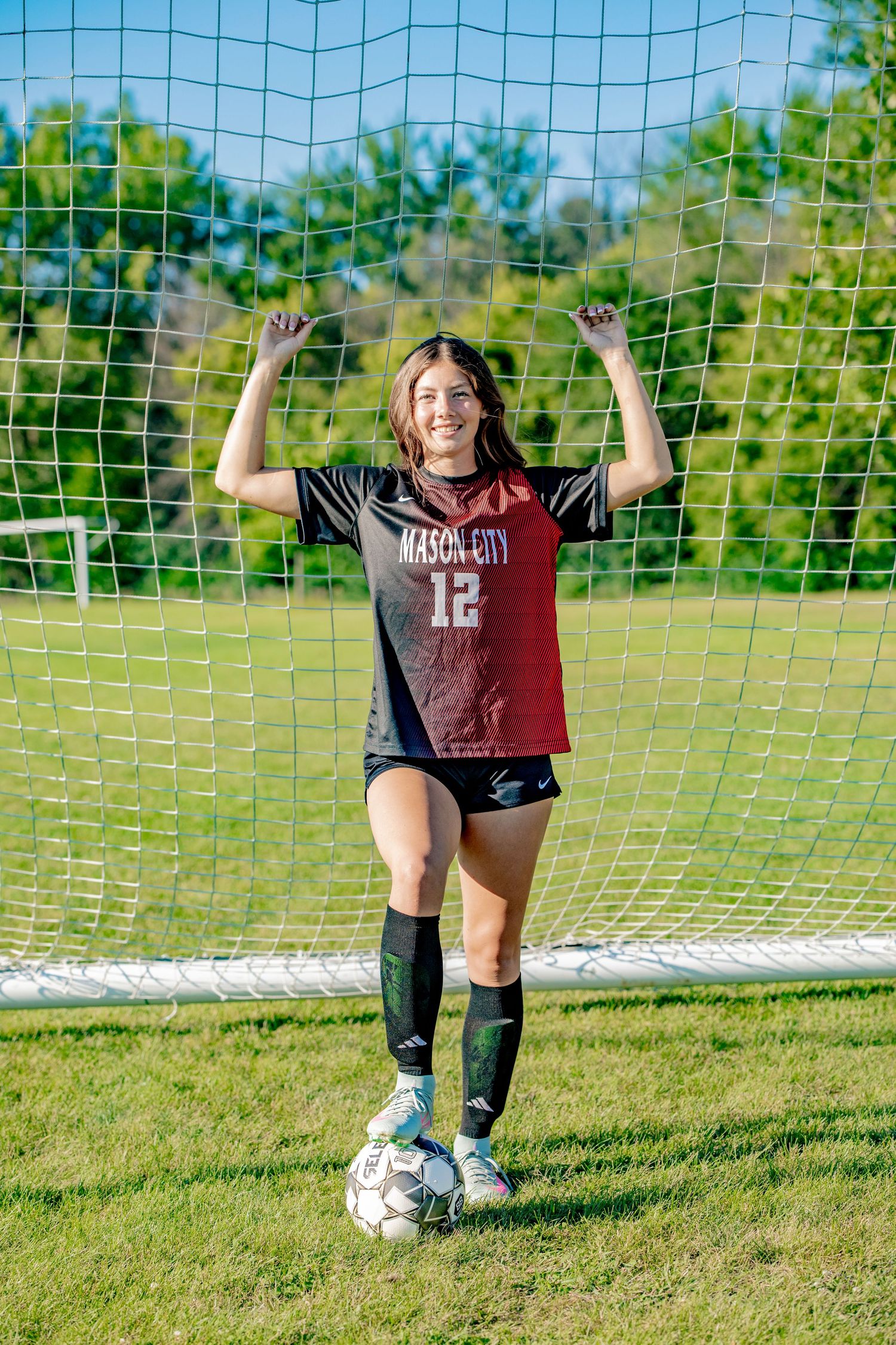 Sequence of shots showing soccer practice drills near goal with net visible in outdoor field setting.