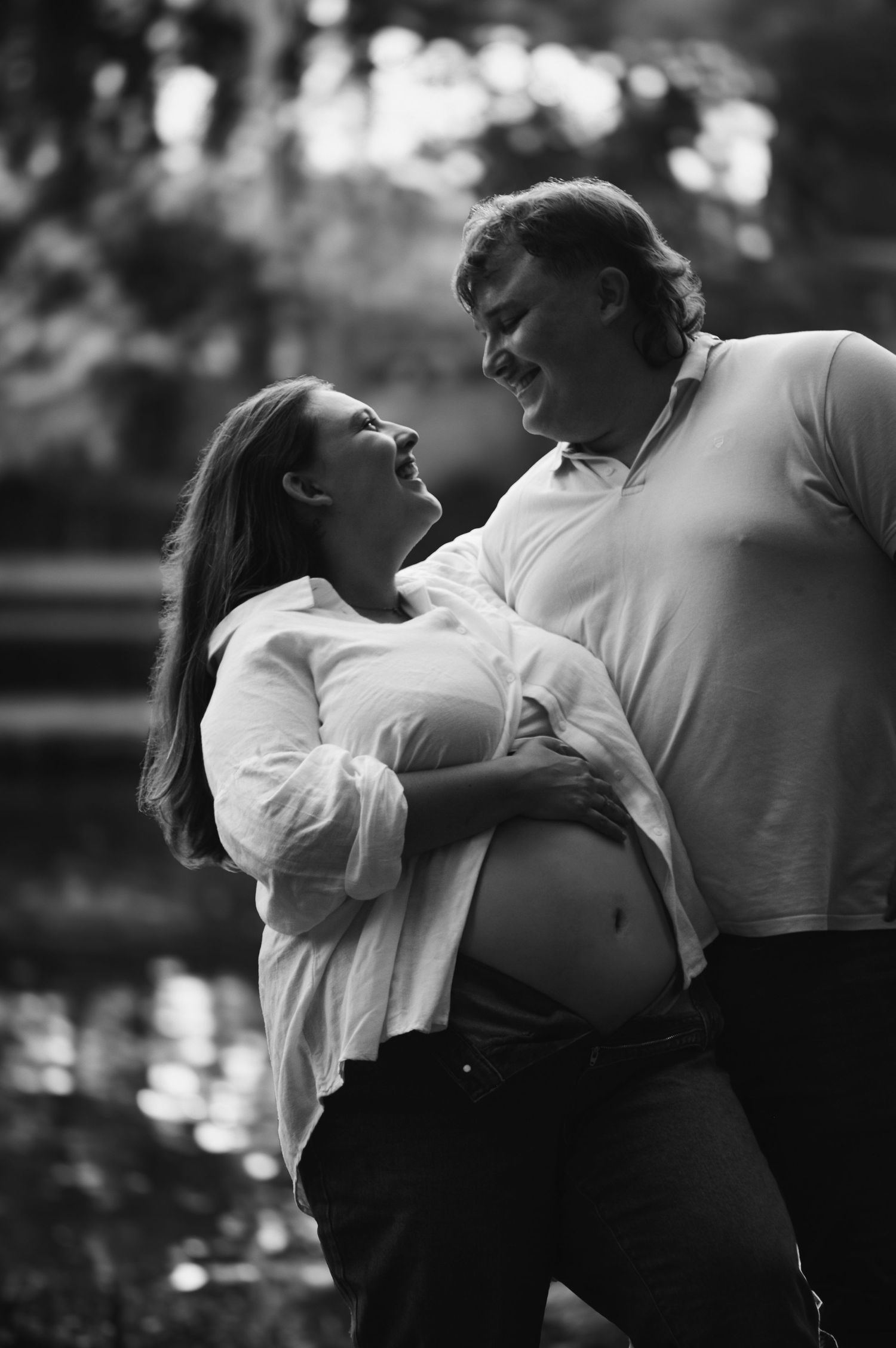 Black and white images showing intimate dance poses between two people in an outdoor setting.