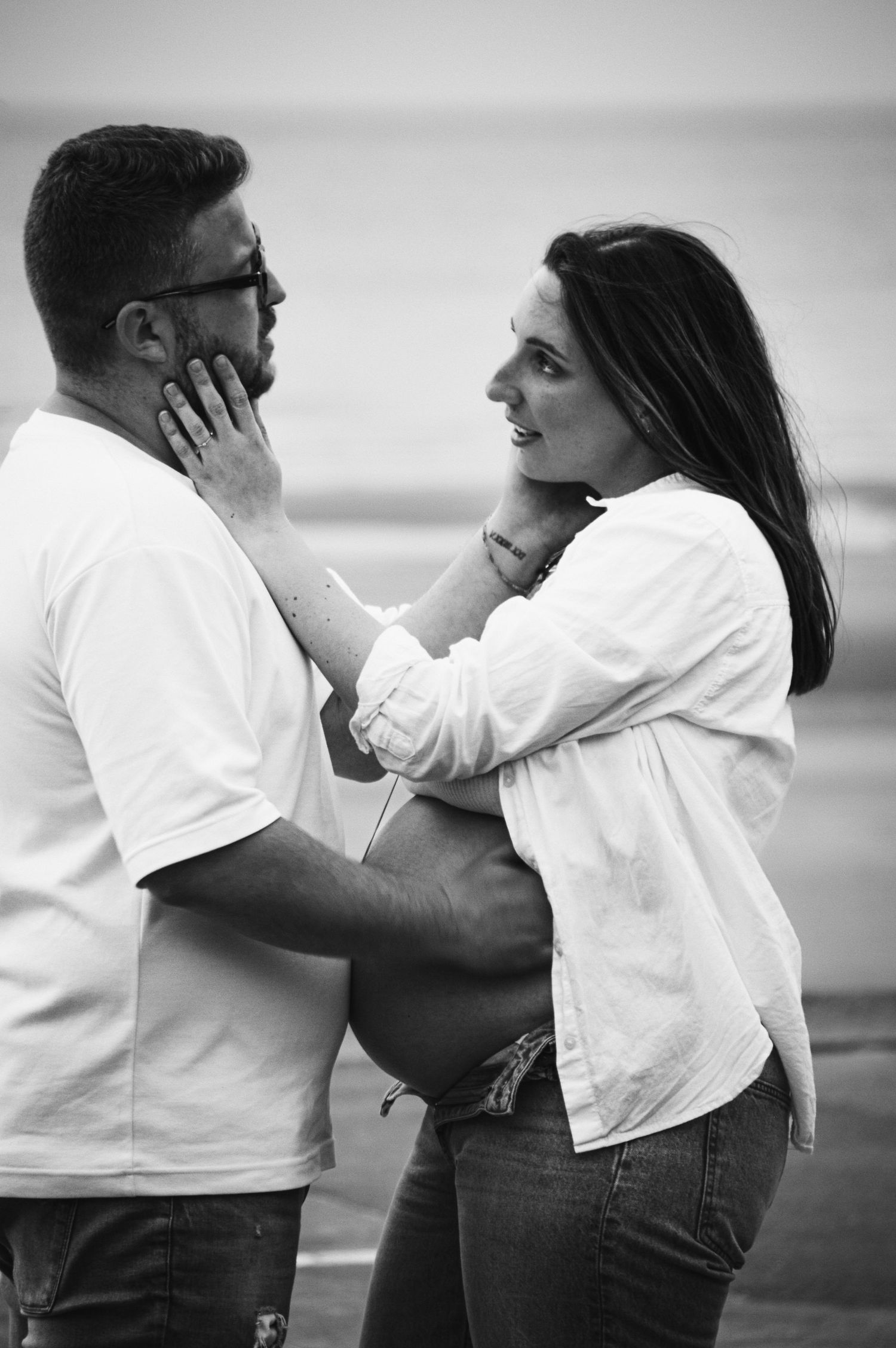 An intimate series of photos shows a couple embracing and laughing together outdoors.
