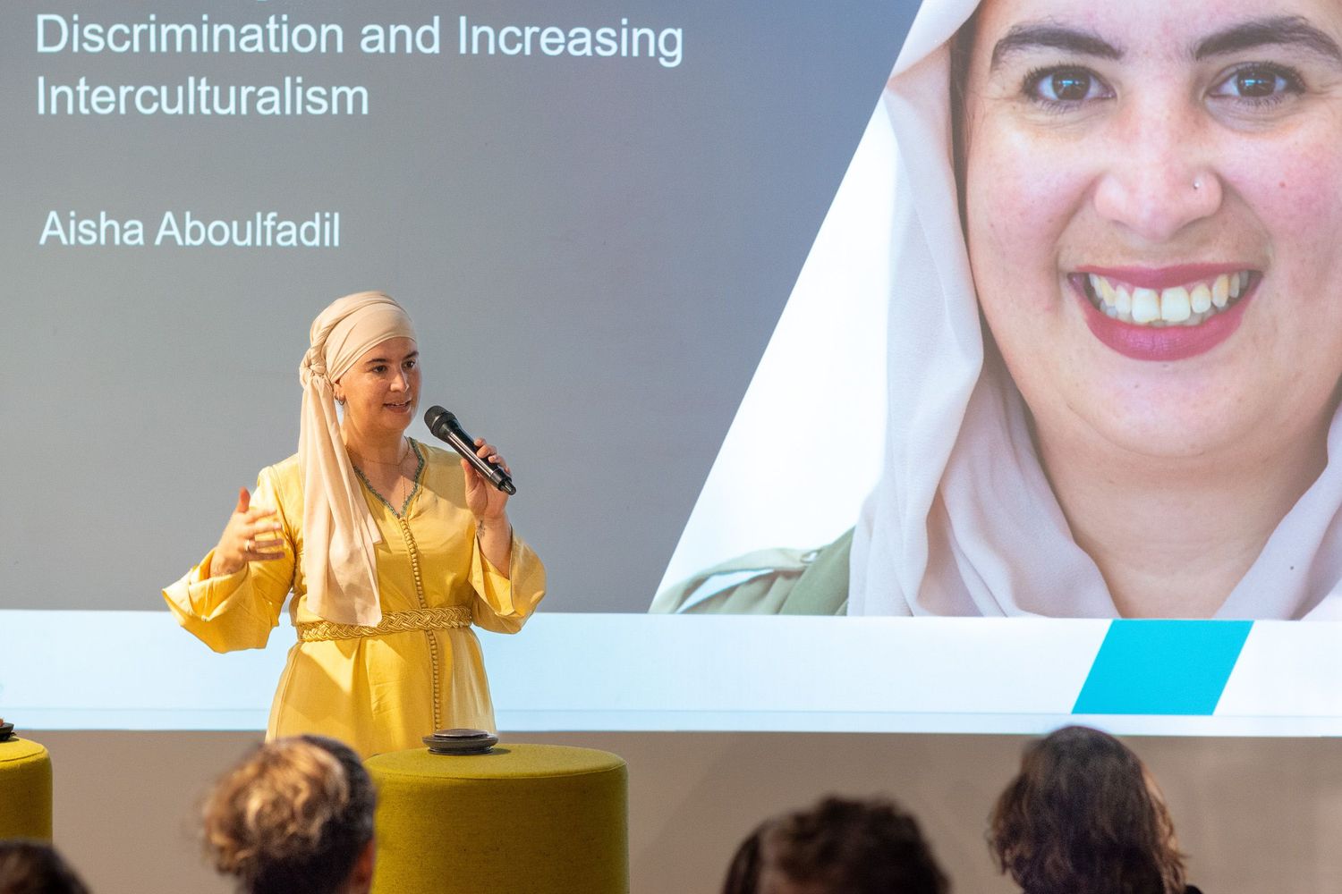 Aisha Aboulfadil speaks an event discussing Discrimination and Increasing Interculturalism.
