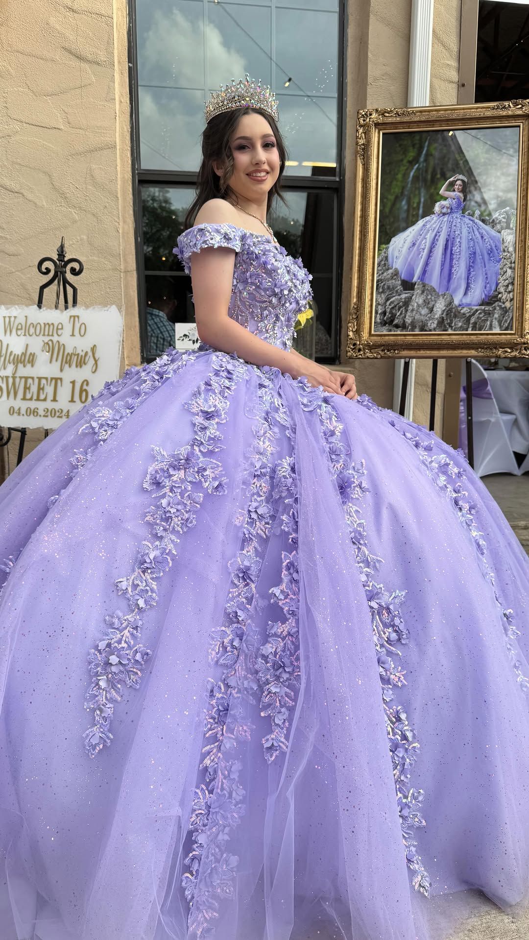 Young woman in lavender floral ball gown with crown posing at her Sweet 16 birthday celebration at Josabi's Acres in Helotes, Texas.