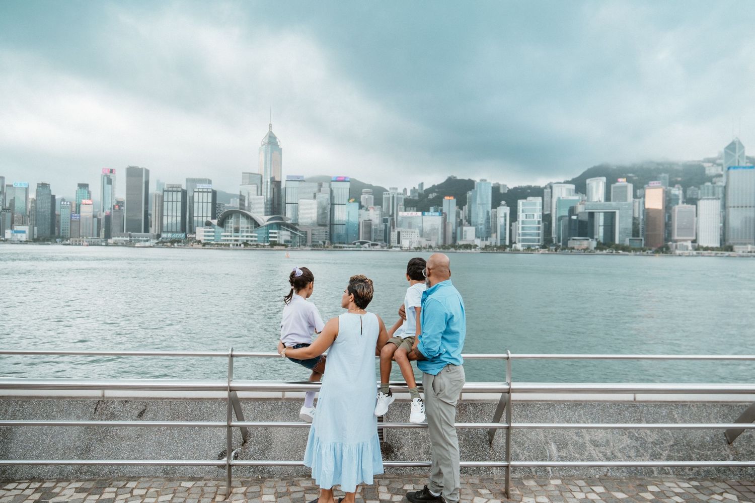 Family portrait session at Victoria Harbour TST in Hong Kong